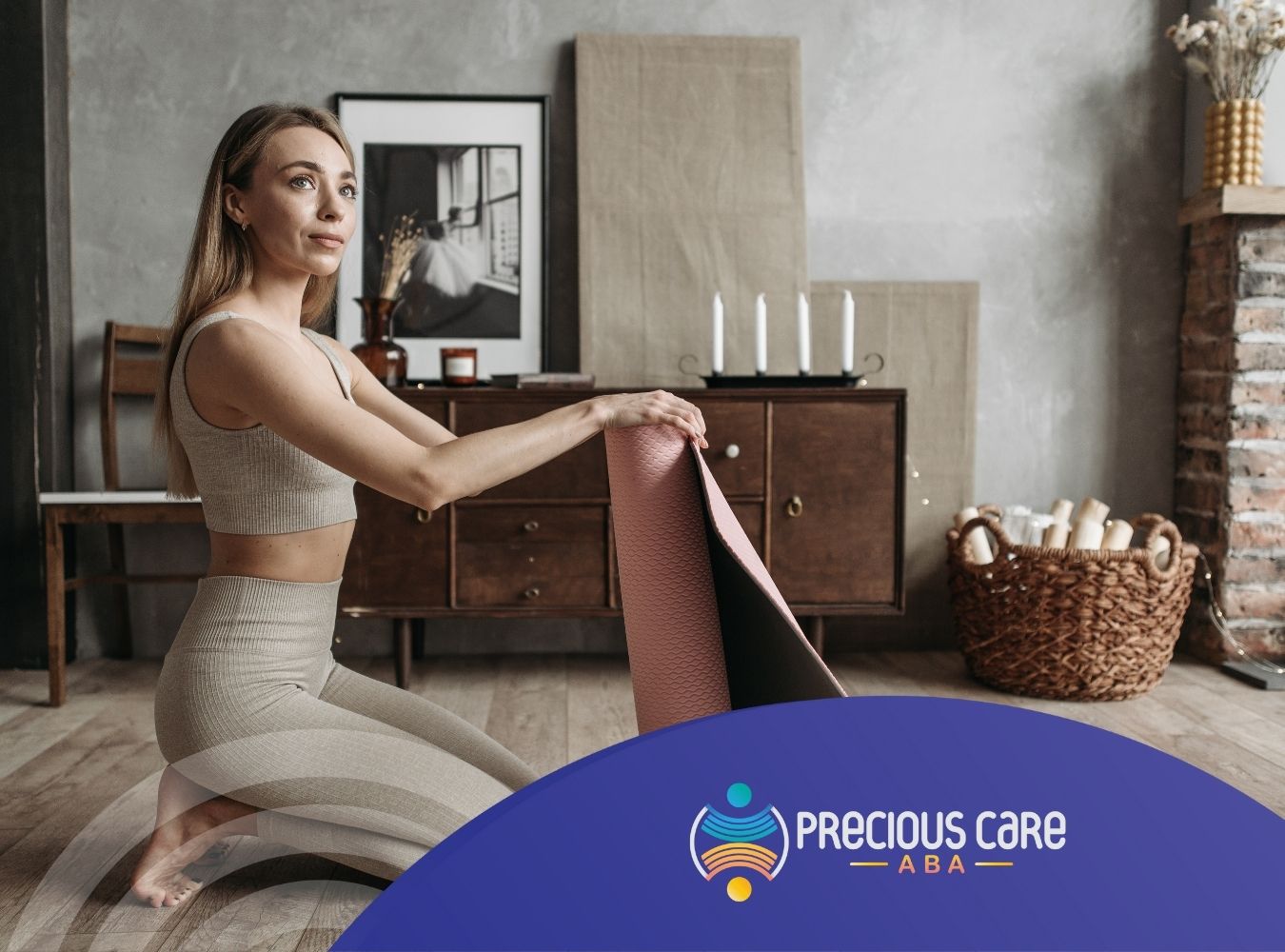 A woman holding a yoga mat.
