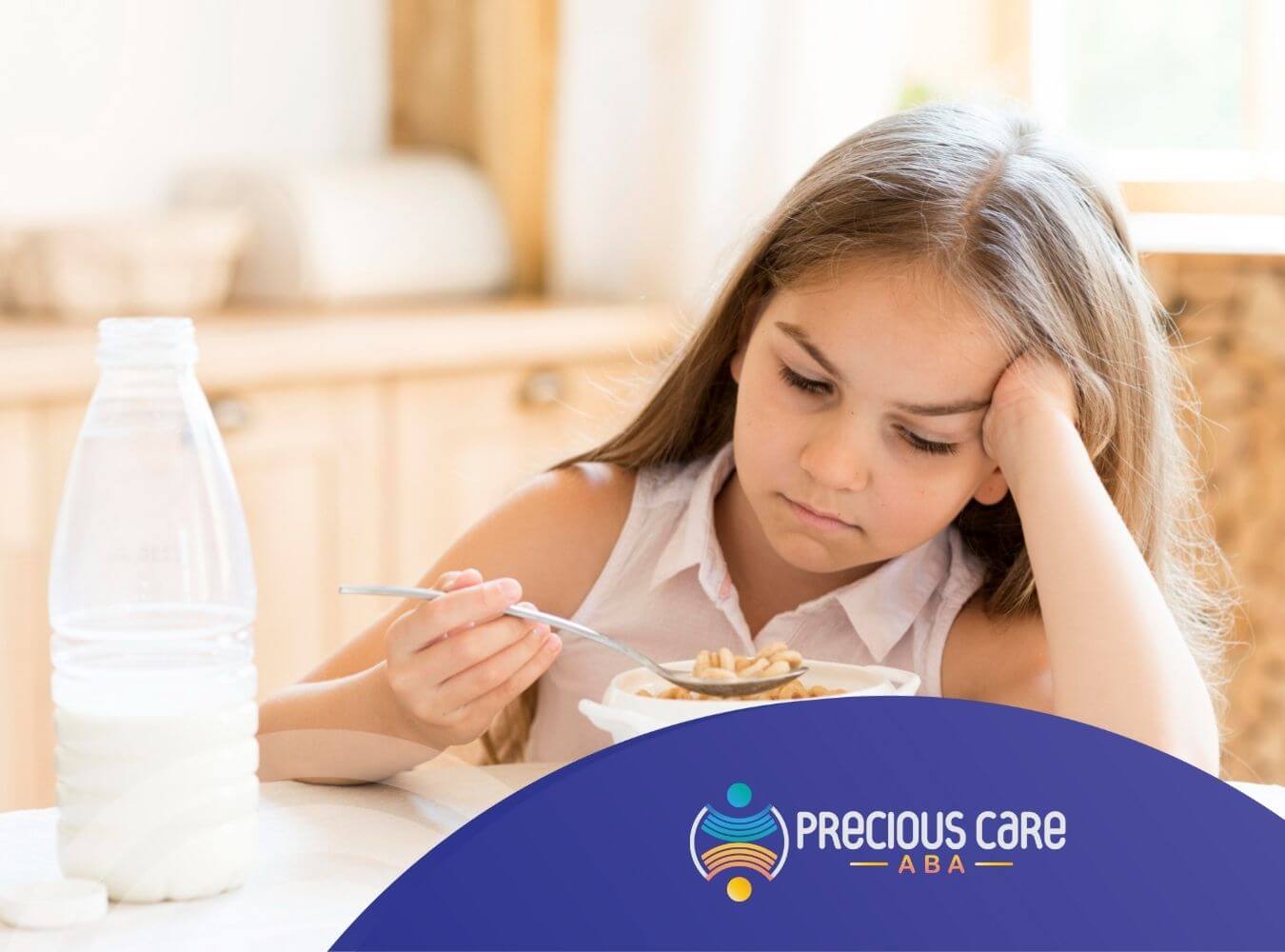 A girl with autism is sitting at a table with a bowl of cereal and milk, looking bored.