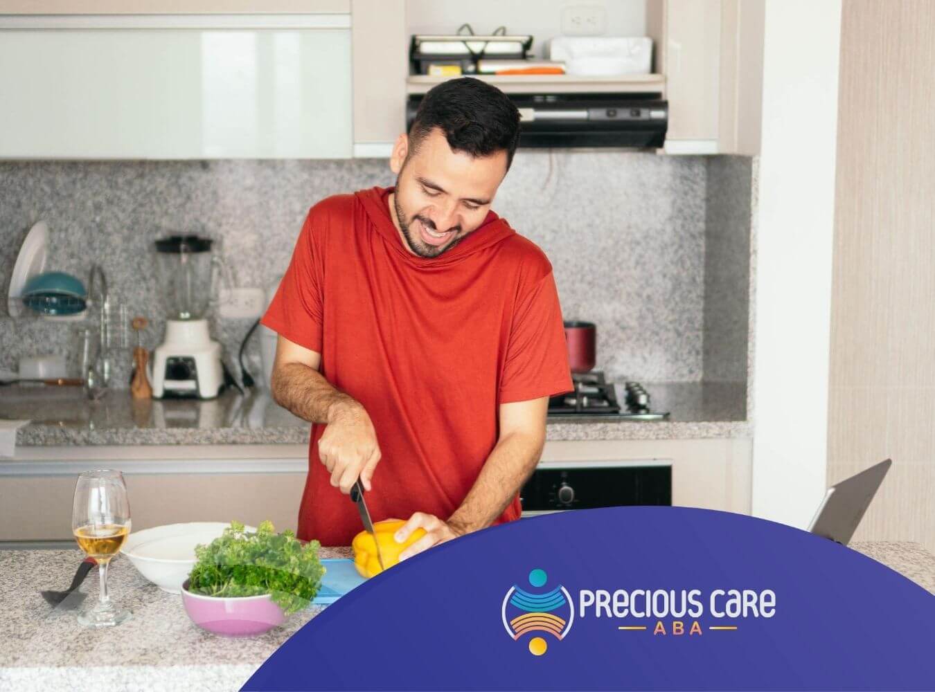 An autistic man chopping vegetables in a kitchen.