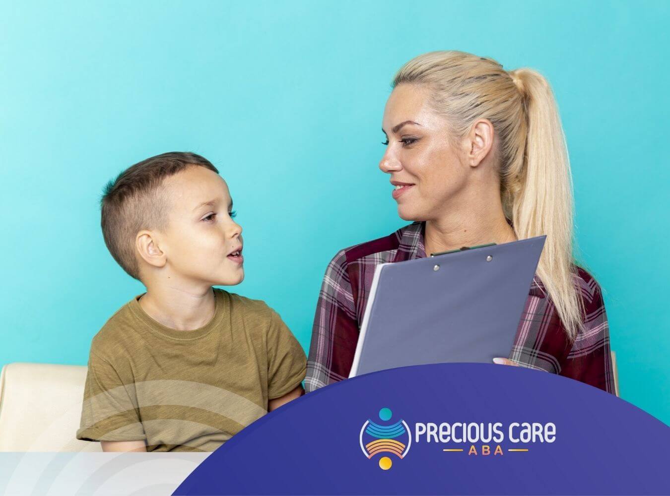 ABA therapist communicating with child in a ABA therapy session.