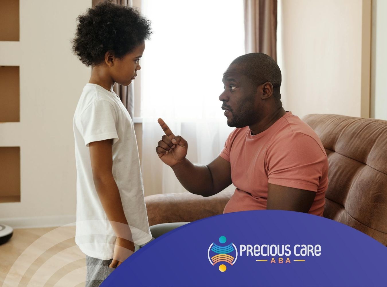 An ABA therapist talking seriously to an autistic child during ABA therapy session at home in NJ.