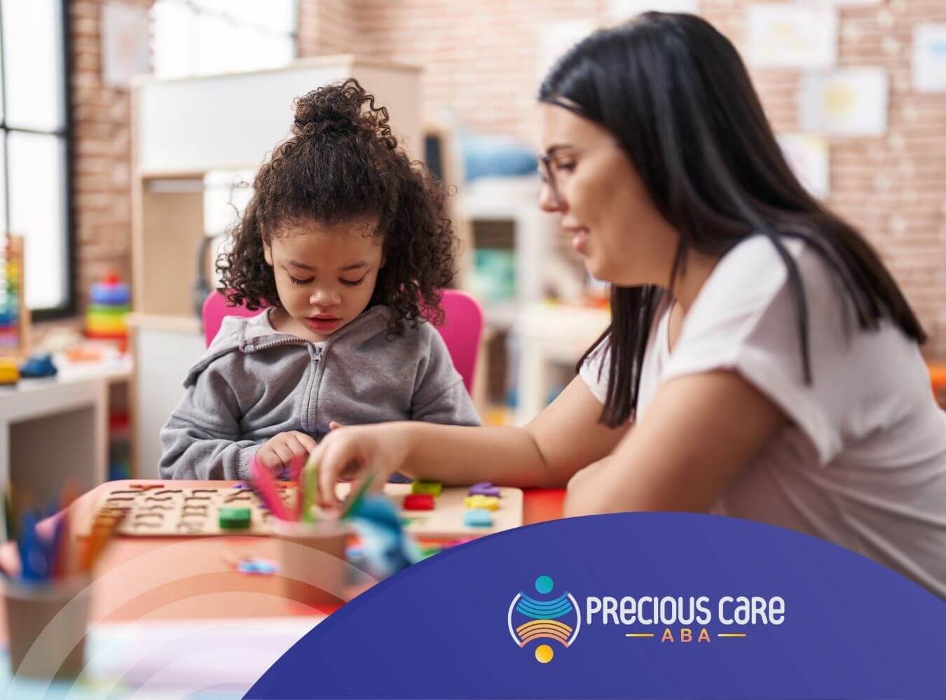 ABA therapist and autistic child are sitting at a table, engaged in a creative activity with colorful blocks and shapes in ABA therapy.