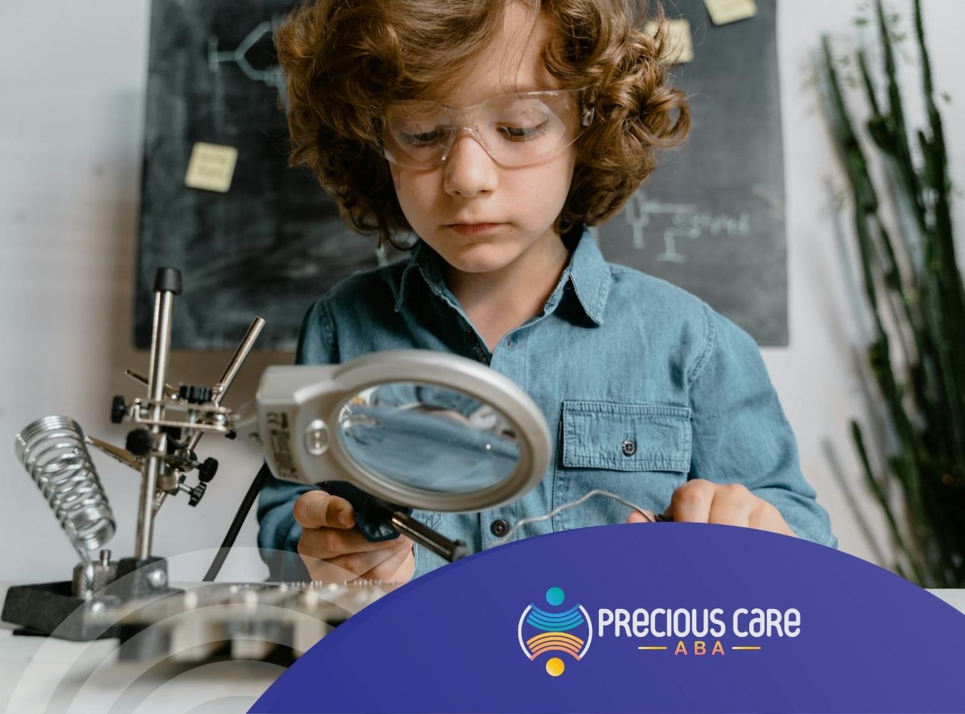 An autistic child soldering with magnifying glass and circuit board during school-based ABA therapy in Maryland.